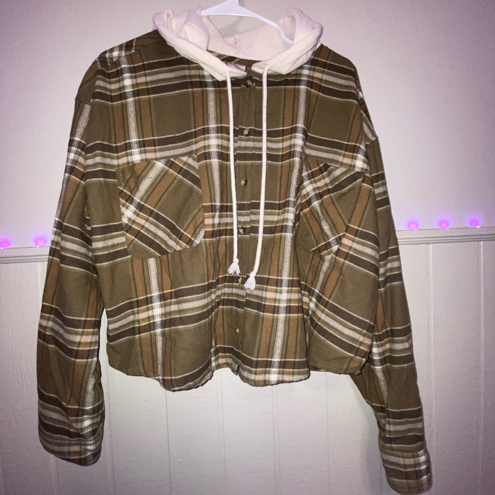 Brown plaid jacket.